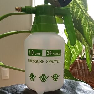 Vibrant Green Accented White Pressure Sprayer